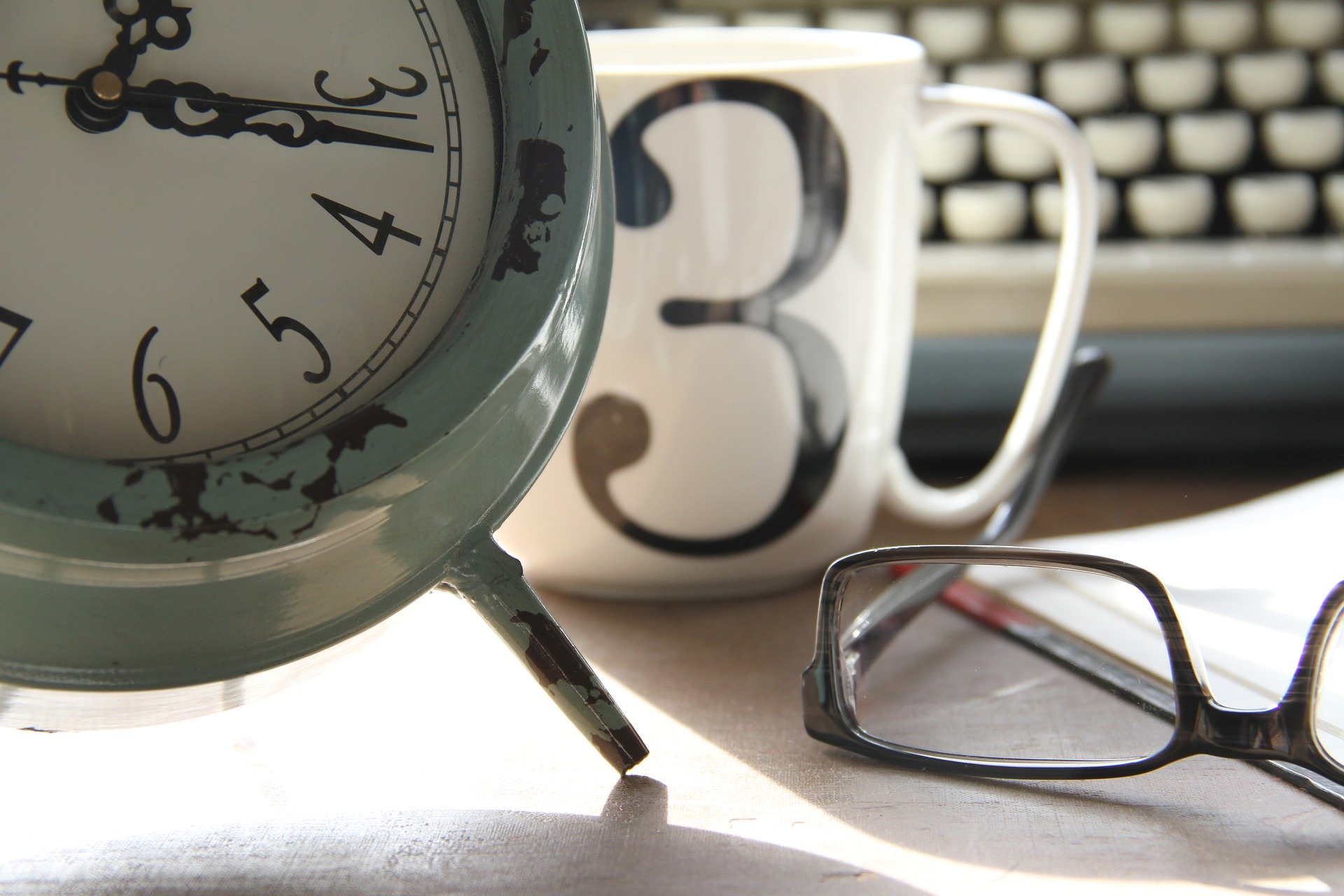 typewriter mug clock glasses